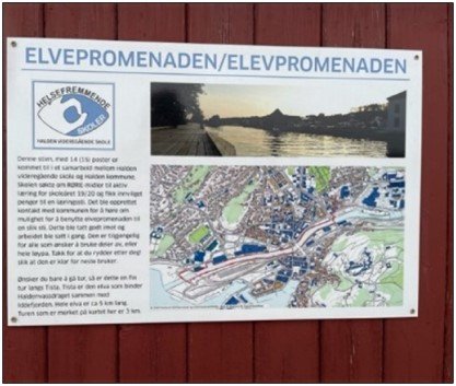 Et skilt med kart og tekst